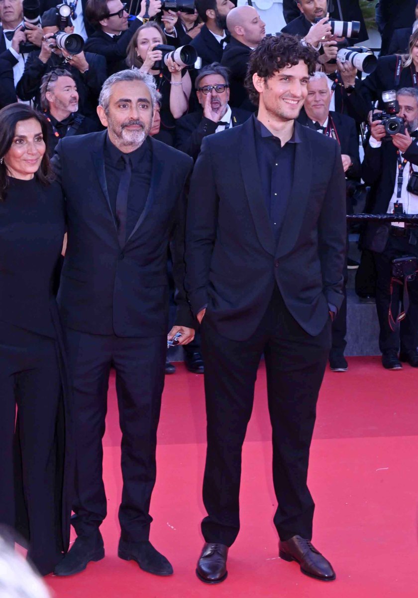 A coté d'Eric Tolédano Louis Garrel Bogosse un max sur le red carpet !